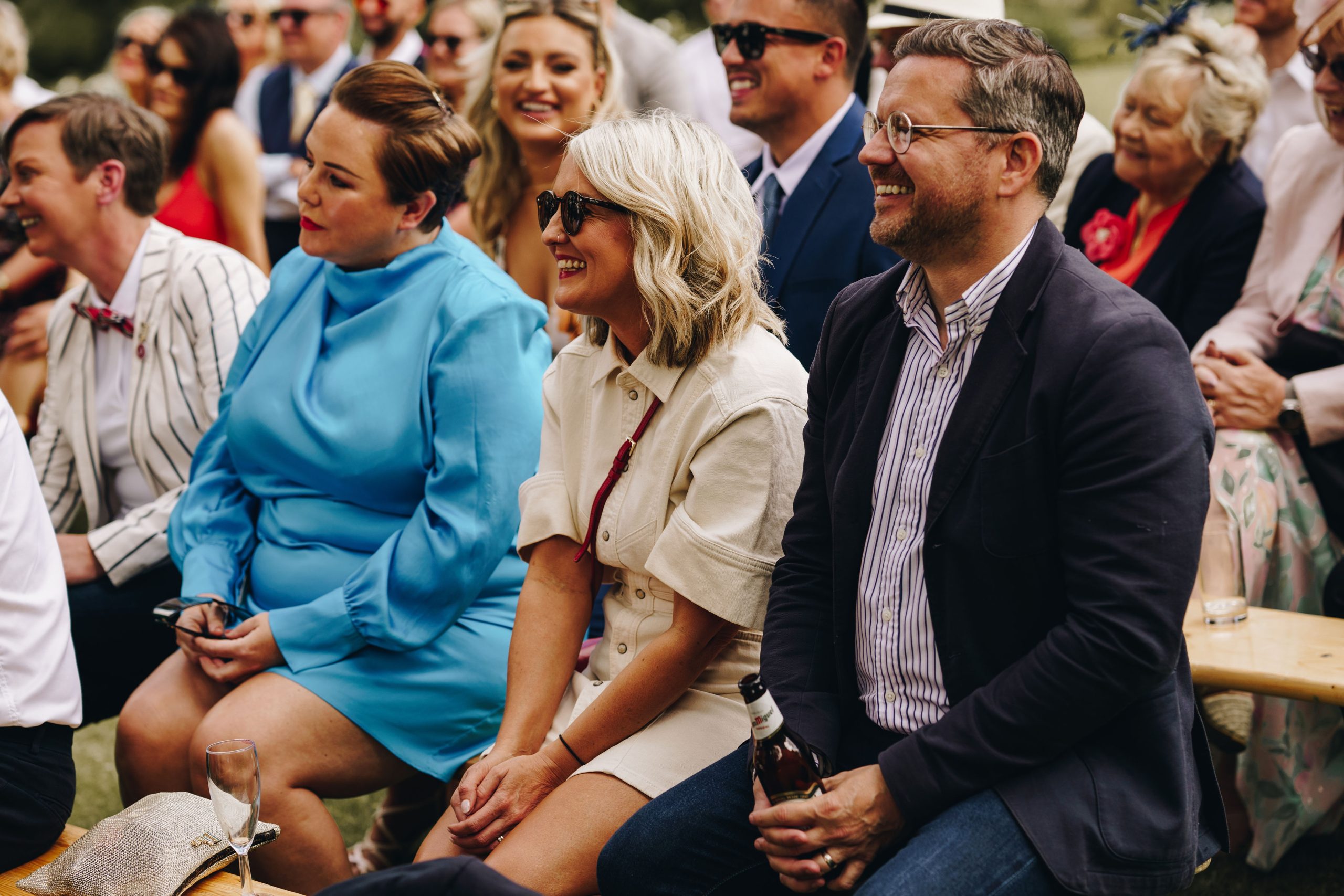 Guests laughing during relaxed celebrant wedding ceremony at Talton Lodge