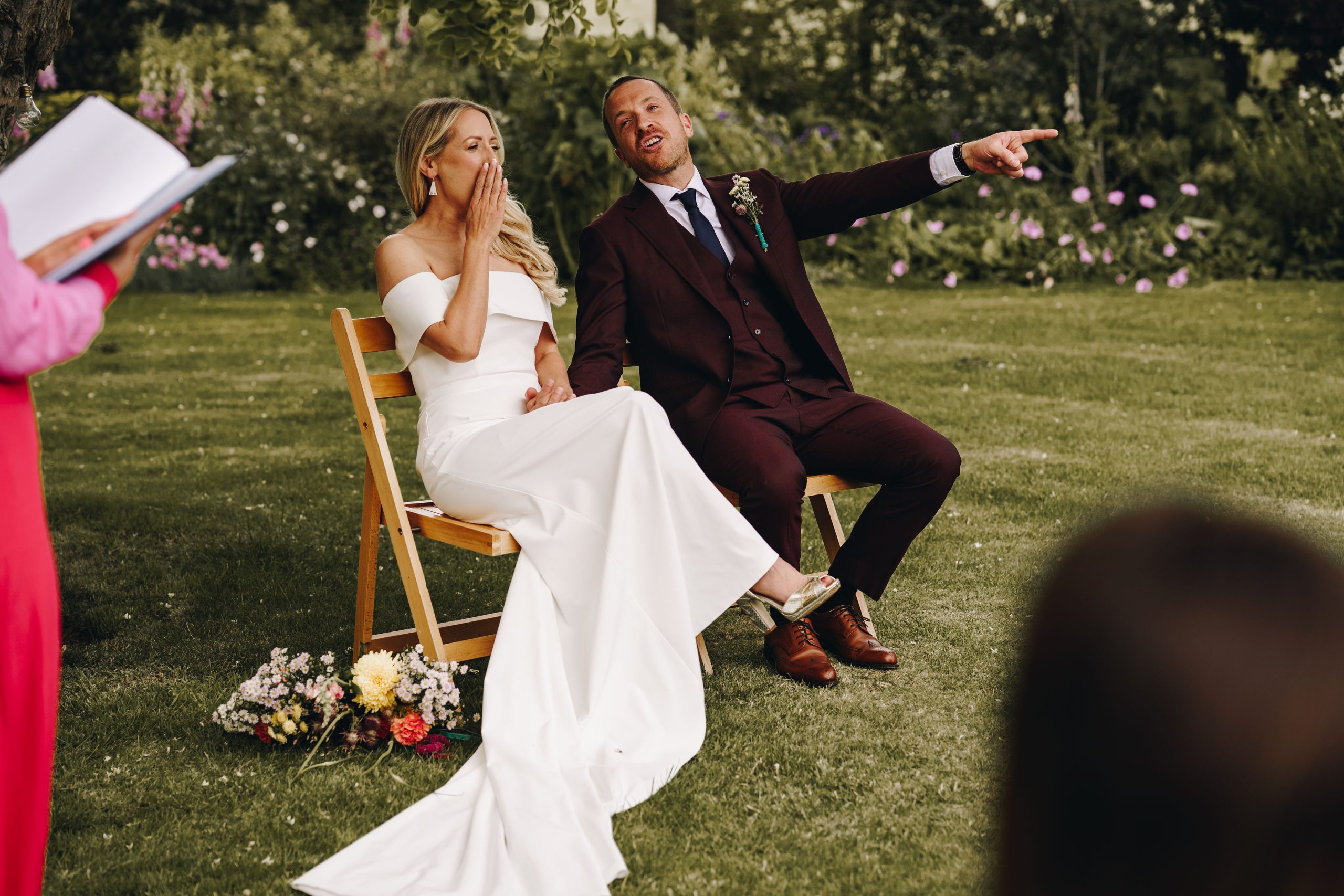 Talton lodge wedding with celebrant Laura Gimson with couple shouting and heckling joyfully during their humanist ceremony.